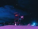 shopping cart in front of night sky