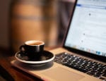 espresso cup on laptop