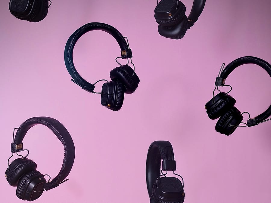 headphones on purple background